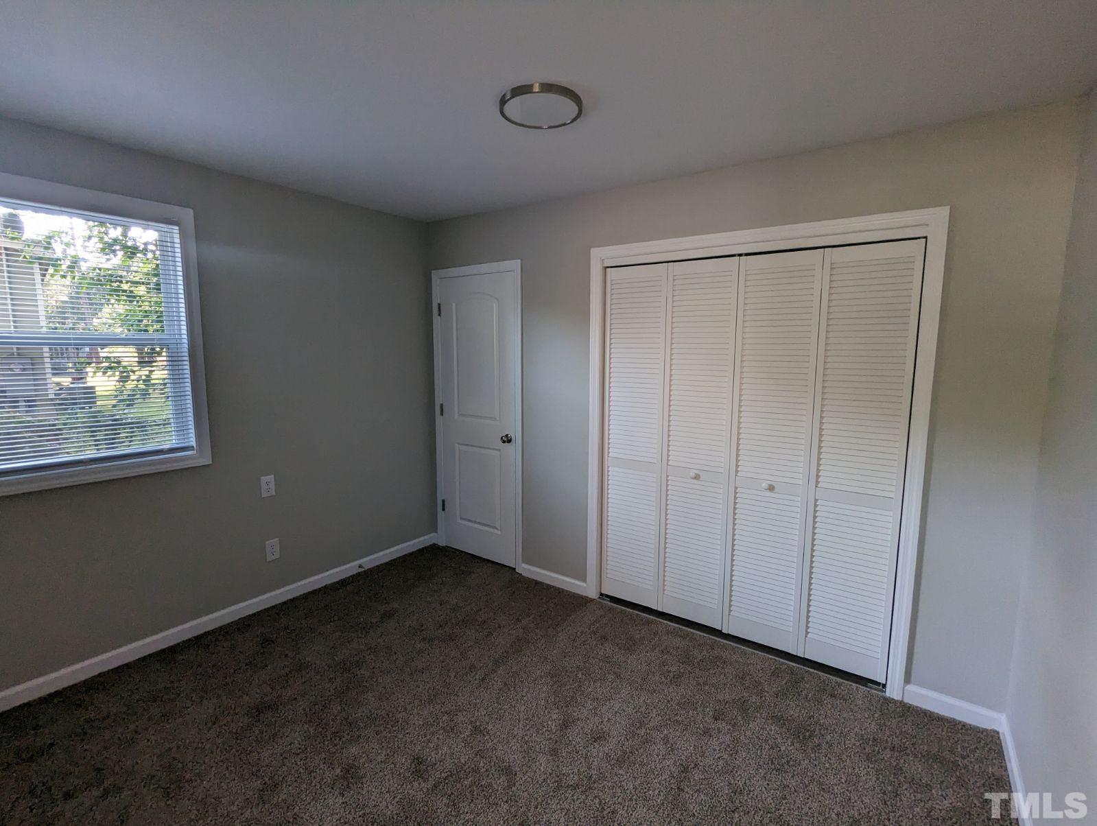 30 Alton Acres Subdivision Road Louisburg, NC 27549 - Photo 19 of 35 a view of an empty room with a window