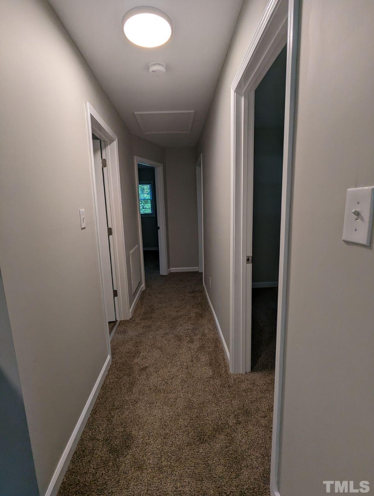 30 Alton Acres Subdivision Road Louisburg, NC 27549 - Photo 22 of 35 an entryway door with a hallway in the house