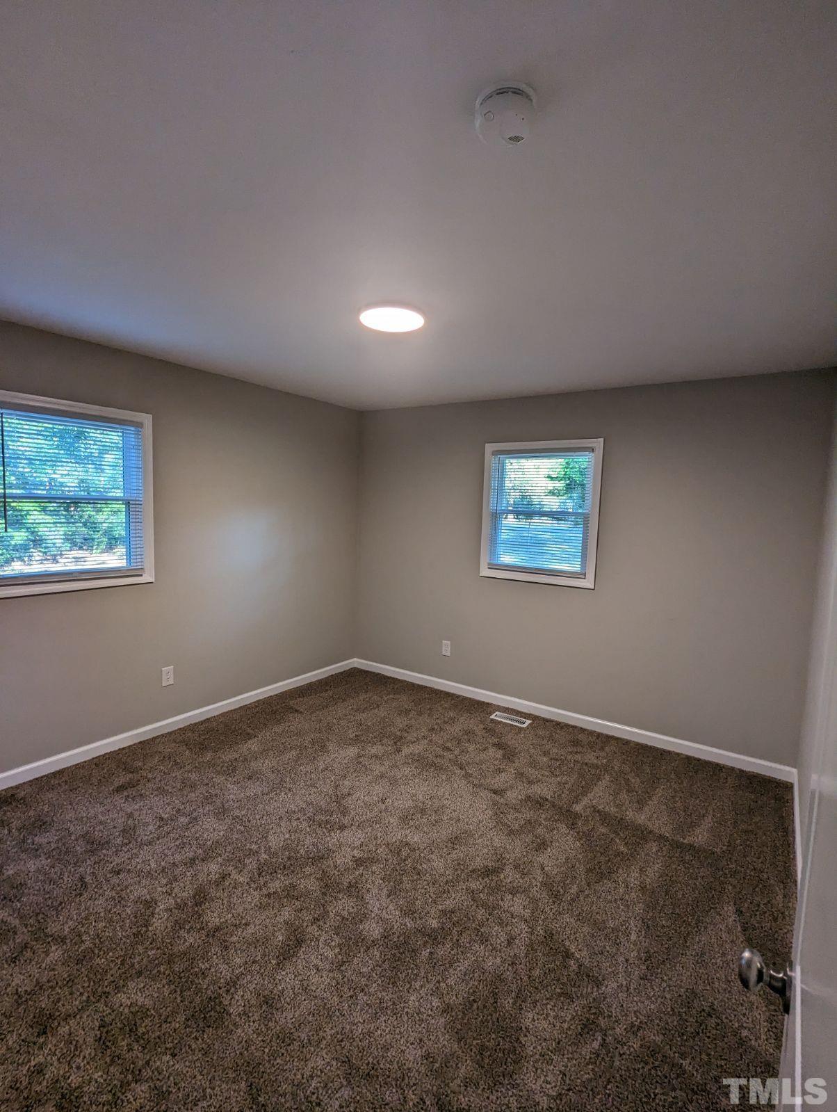 30 Alton Acres Subdivision Road Louisburg, NC 27549 - Photo 24 of 35 an empty room with a window