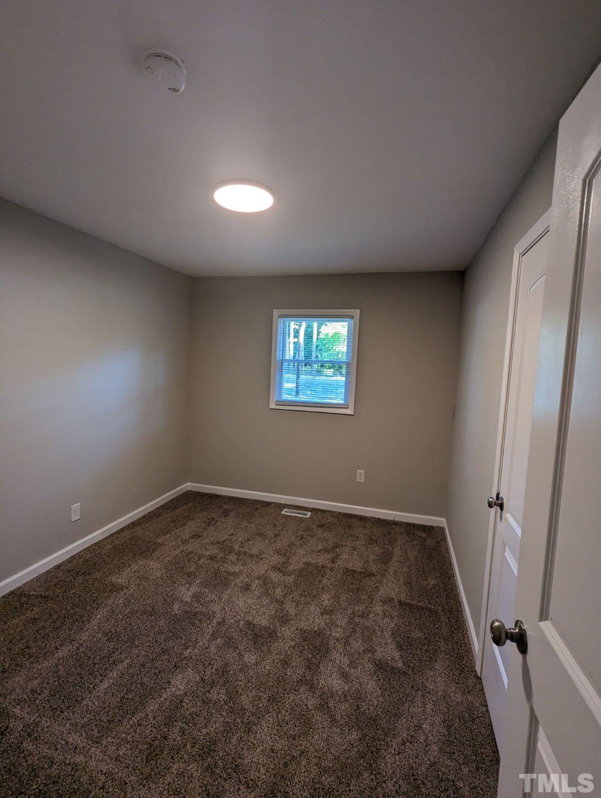 30 Alton Acres Subdivision Road Louisburg, NC 27549 - Photo 28 of 35 a view of an empty room and a window