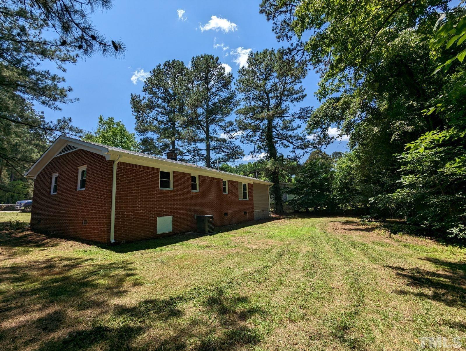 30 Alton Acres Subdivision Road Louisburg, NC 27549 - Photo 31 of 35 a view of a backyard