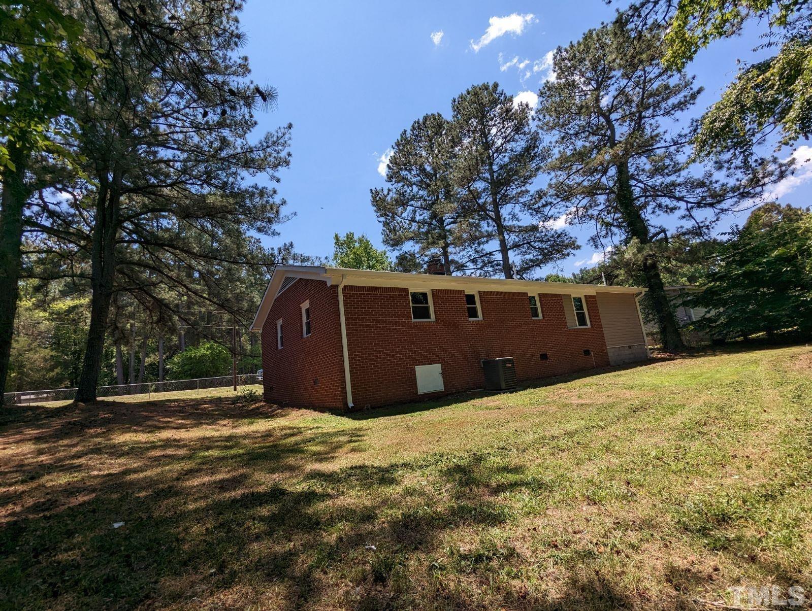 30 Alton Acres Subdivision Road Louisburg, NC 27549 - Photo 32 of 35 a house view with a outdoor space