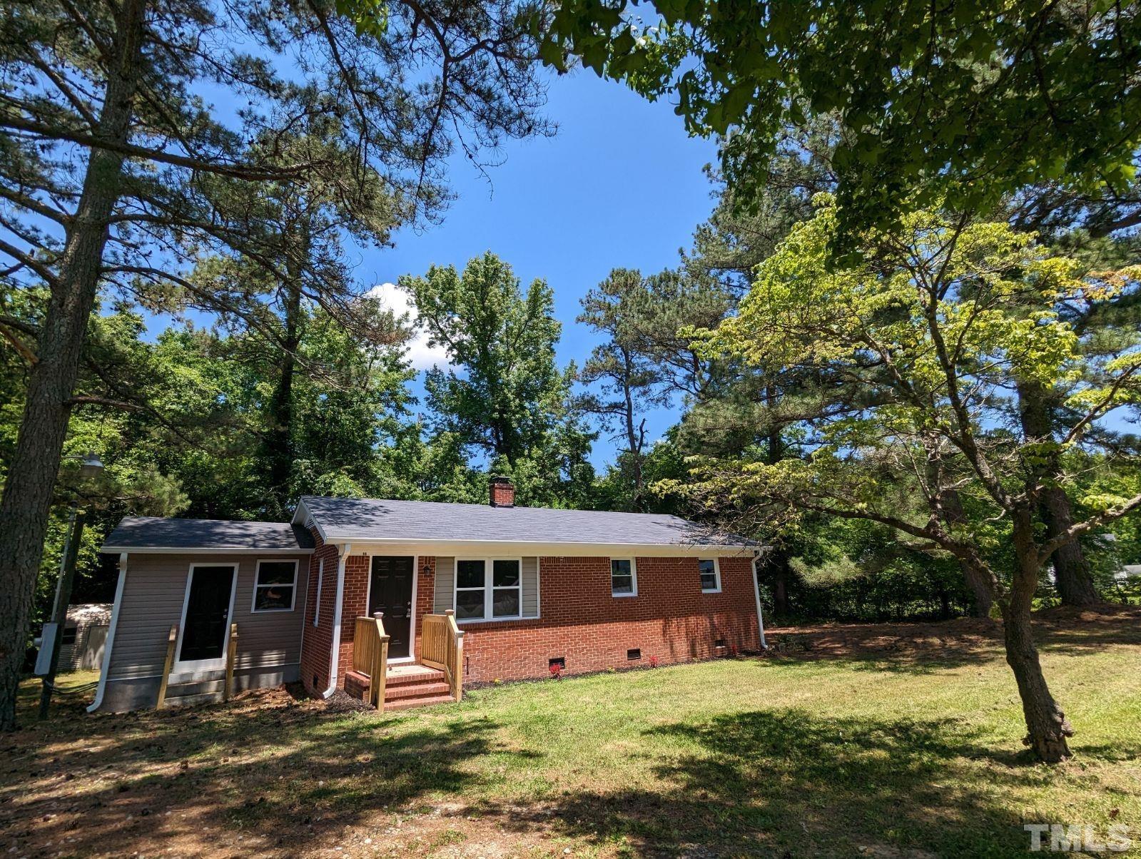 30 Alton Acres Subdivision Road Louisburg, NC 27549 - Photo 5 of 35 front view of a house with a yard