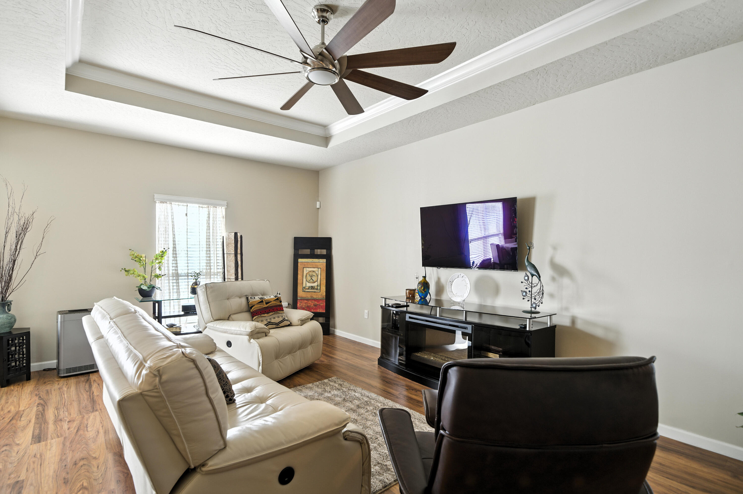 4629 Hermosa Road Crestview, FL 32539 - Photo 3 of 26 a living room with furniture and a flat screen tv