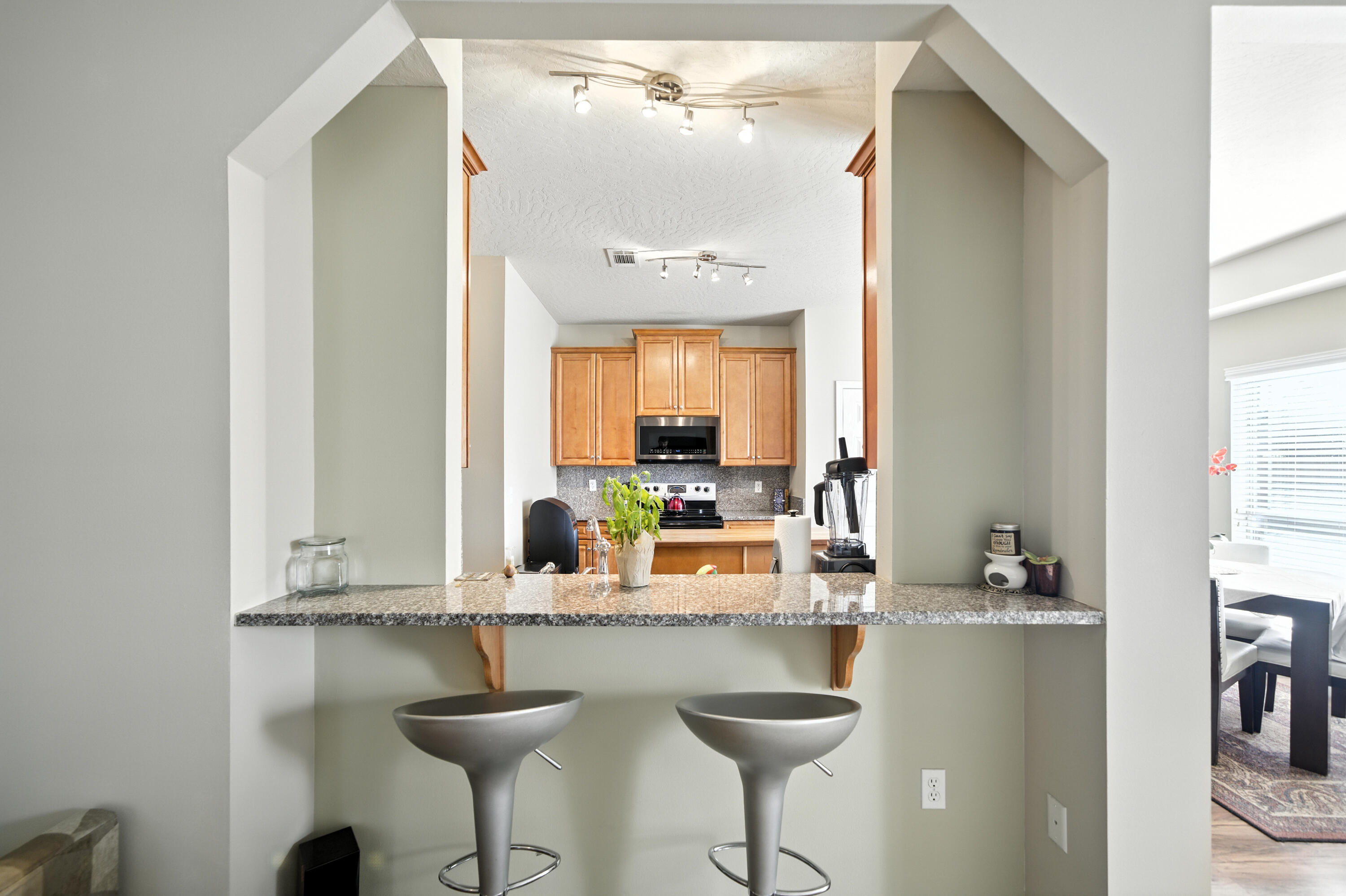 4629 Hermosa Road Crestview, FL 32539 - Photo 4 of 26 a kitchen with a sink and a mirror