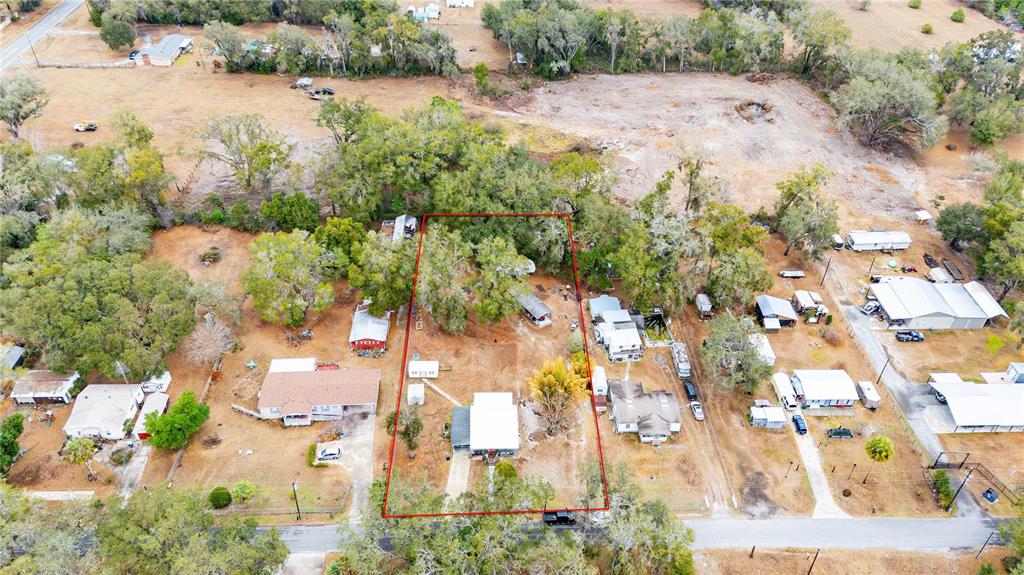 110 County Road 534 Bushnell, FL 33513 - Photo 30 of 60 an aerial view of residential houses with outdoor space