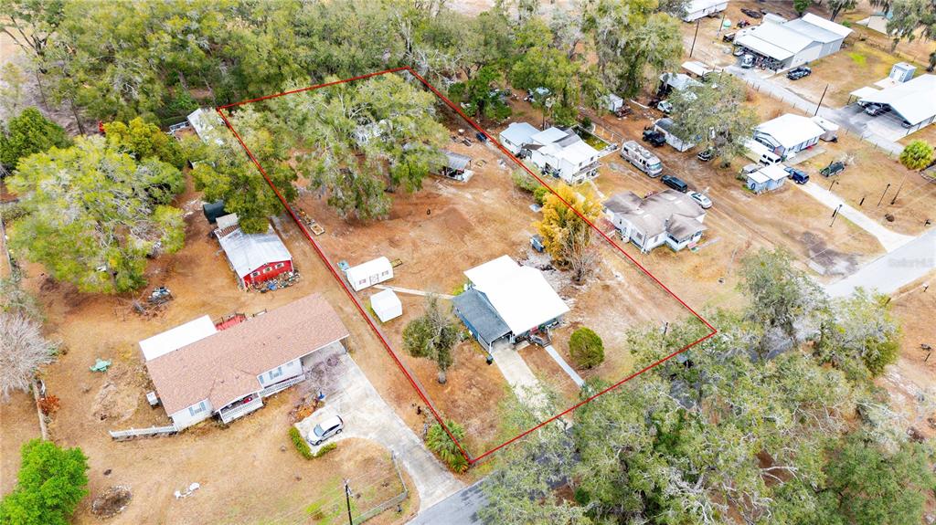 110 County Road 534 Bushnell, FL 33513 - Photo 32 of 60 an aerial view of residential houses with yard