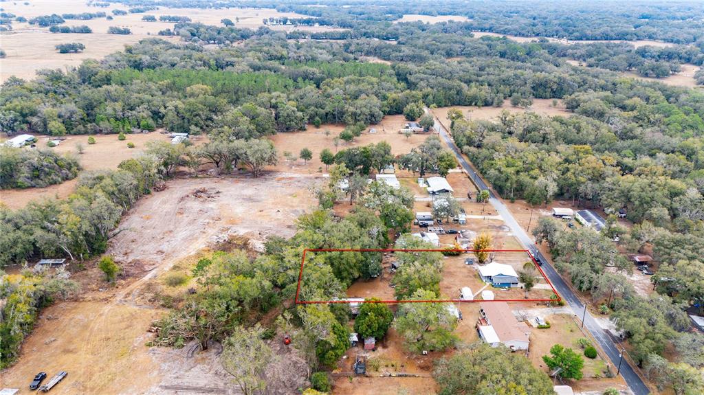 110 County Road 534 Bushnell, FL 33513 - Photo 36 of 60 an aerial view of residential houses with outdoor space