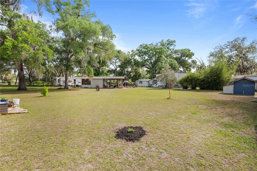 110 County Road 534 Bushnell, FL 33513 - Photo 48 of 60 a view of a swimming pool and an outdoor space