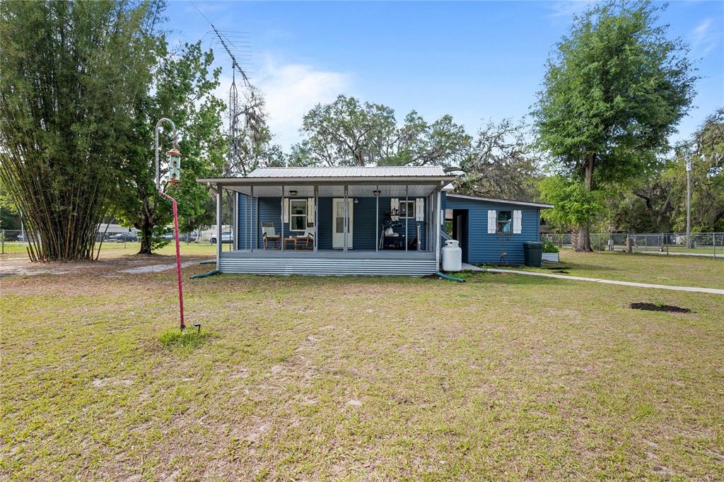 110 County Road 534 Bushnell, FL 33513 - Photo 49 of 60 a house with swimming pool in front of it