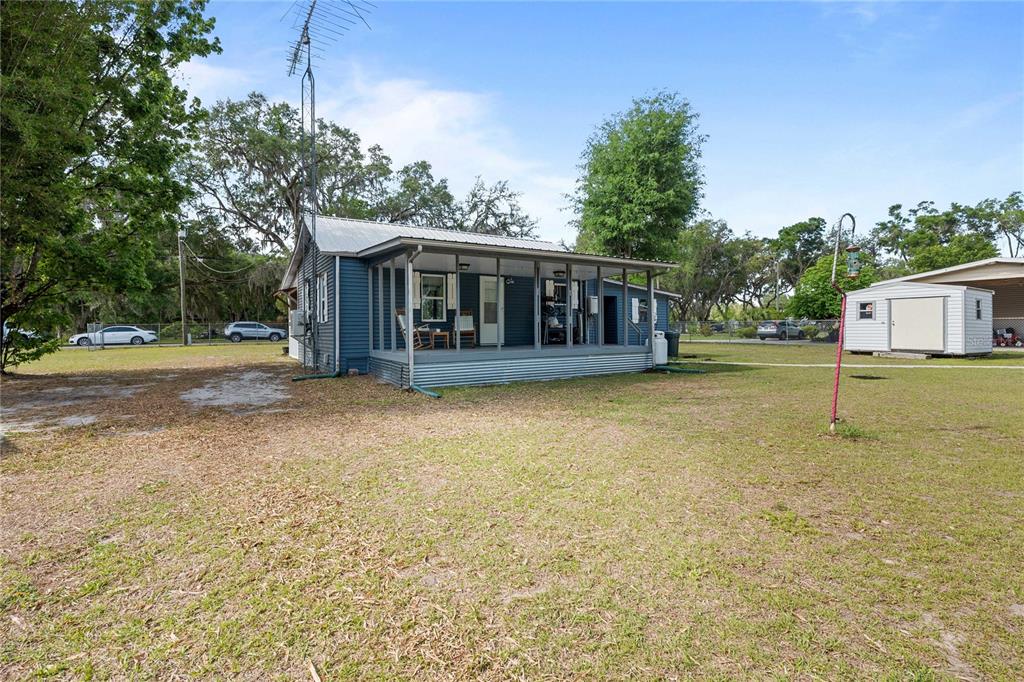 110 County Road 534 Bushnell, FL 33513 - Photo 50 of 60 a view of a house with a yard