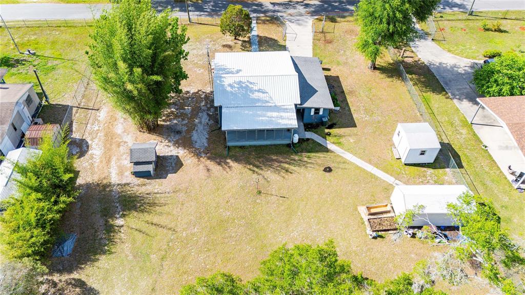110 County Road 534 Bushnell, FL 33513 - Photo 51 of 60 a view of swimming pool with a yard