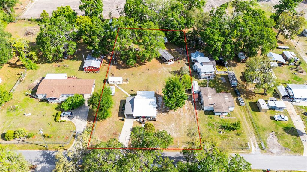 110 County Road 534 Bushnell, FL 33513 - Photo 54 of 60 an aerial view of residential houses with outdoor space
