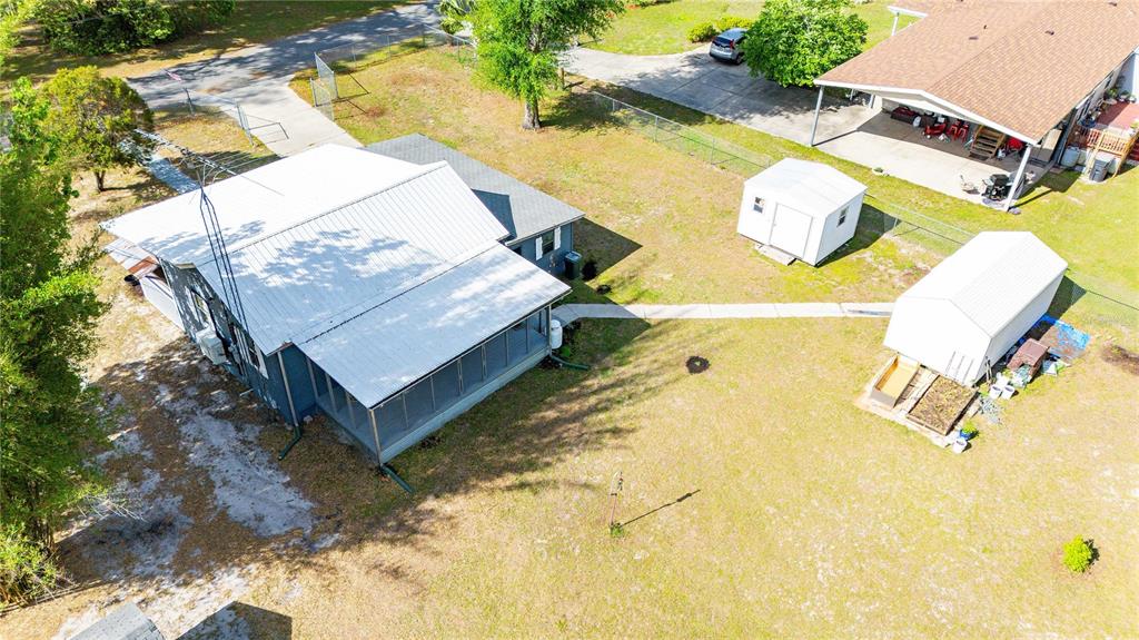 110 County Road 534 Bushnell, FL 33513 - Photo 60 of 60 an aerial view of a house with a swimming pool