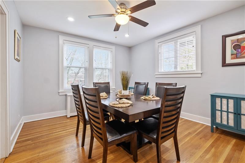 490 Mapleton Avenue Pittsburgh, PA 15228 - Photo 15 of 35 a view of a dining room with furniture window and wooden floor