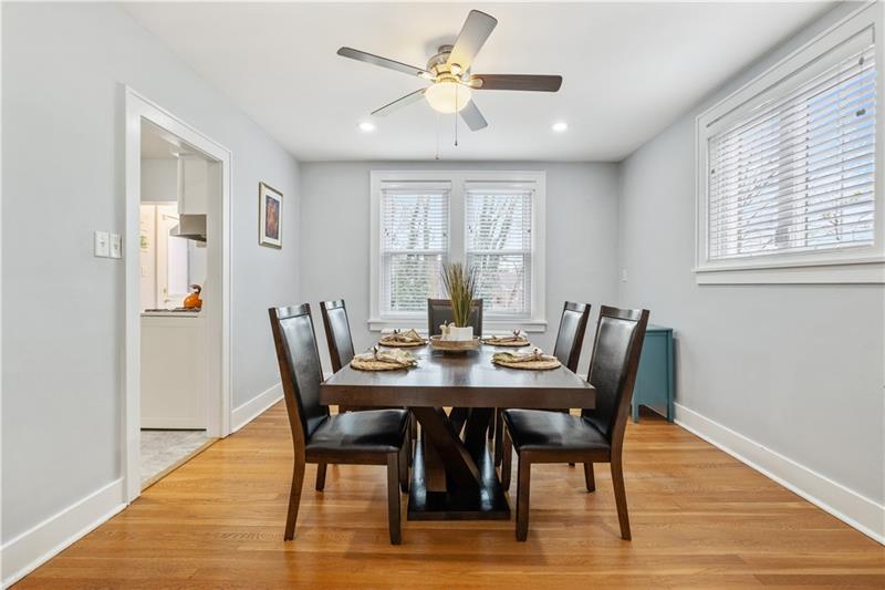 490 Mapleton Avenue Pittsburgh, PA 15228 - Photo 16 of 35 a view of a dining room with furniture window and wooden floor