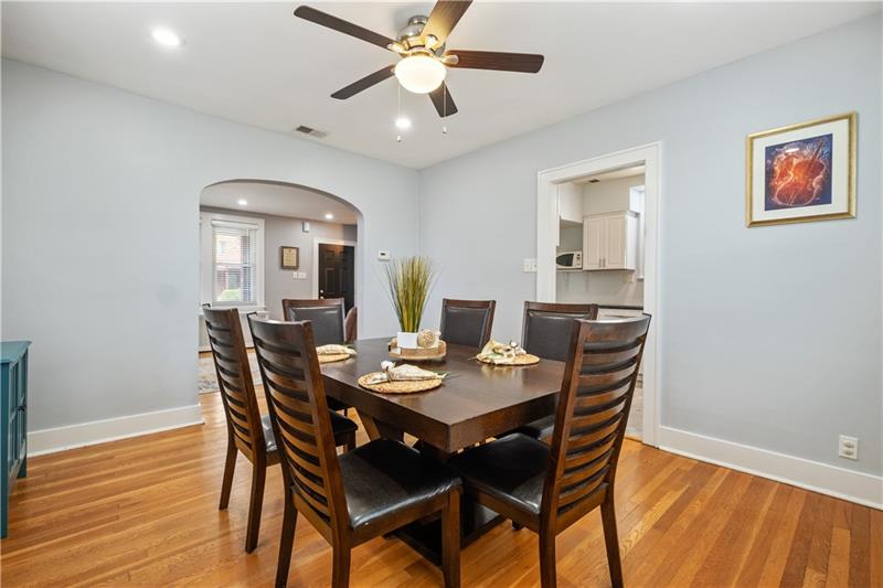 490 Mapleton Avenue Pittsburgh, PA 15228 - Photo 17 of 35 a view of a dining room with furniture and wooden floor
