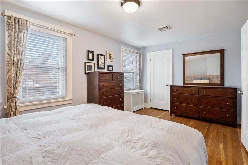 490 Mapleton Avenue Pittsburgh, PA 15228 - Photo 21 of 35 a bedroom with a bed and a dresser