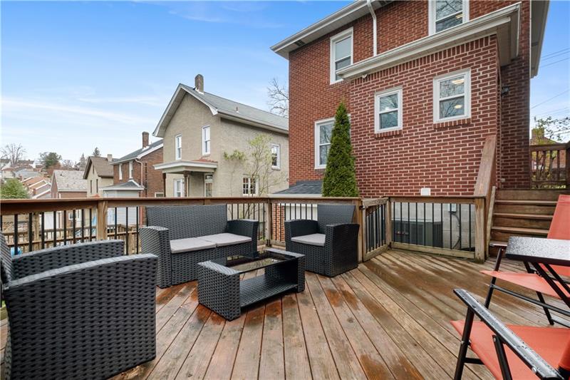 490 Mapleton Avenue Pittsburgh, PA 15228 - Photo 30 of 35 a view of a roof deck with wooden floor and fence