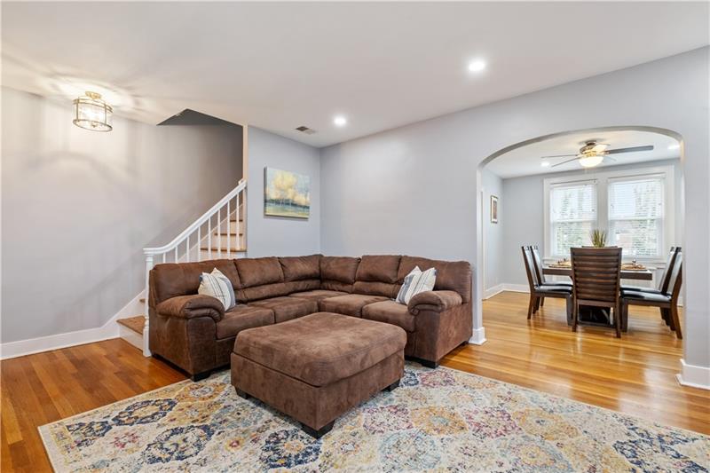 490 Mapleton Avenue Pittsburgh, PA 15228 - Photo 8 of 35 a living room with furniture and a dining table