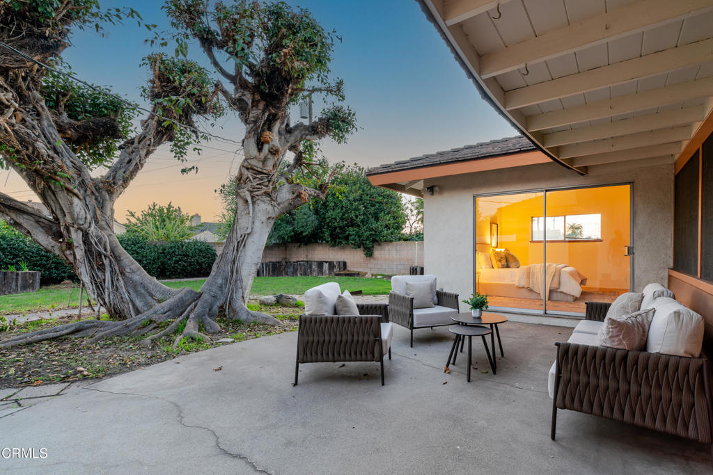 1504 East Grovecenter Street Covina, CA 91724 - Photo 14 of 17 a balcony with furniture and a garden