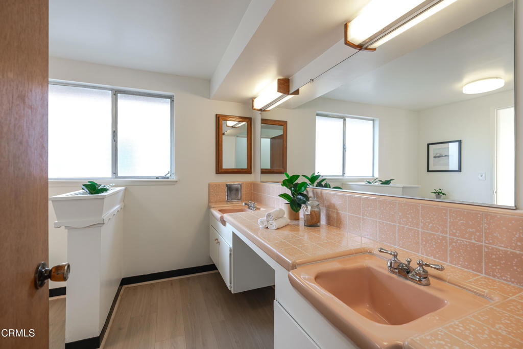1504 East Grovecenter Street Covina, CA 91724 - Photo 9 of 17 a bathroom with a sink a toilet and tub