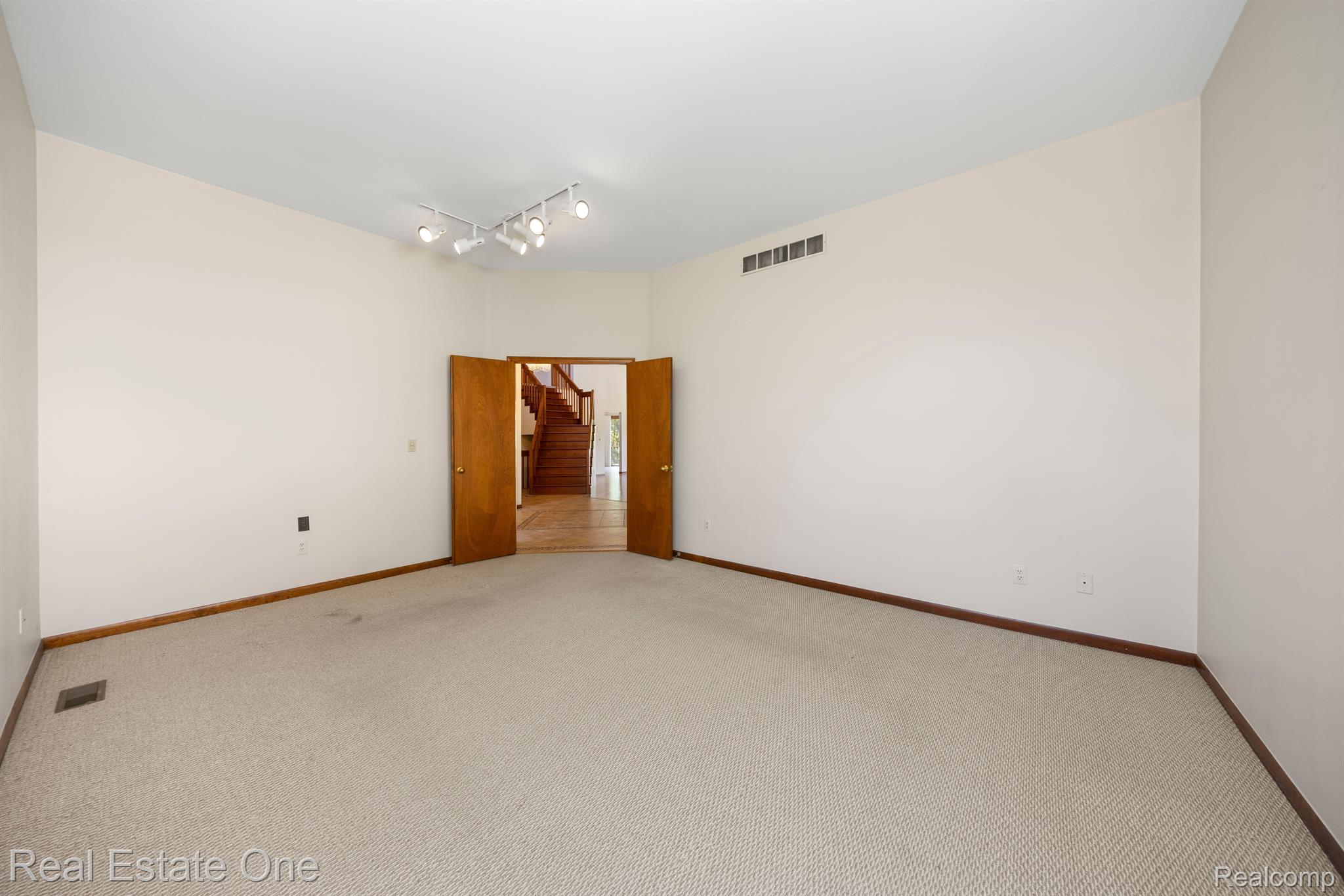30971 Country Ridge Circle Farmington, MI 48331 - Photo 18 of 47 LARGE LIBRARY/SITTING AREA WITH HIGH CEILINGS