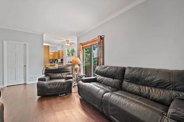 a living room with furniture and a couch
