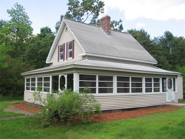 68 Fitchburg Road Townsend, MA 01469 - Photo 1 of 17 a front view of a house with a yard