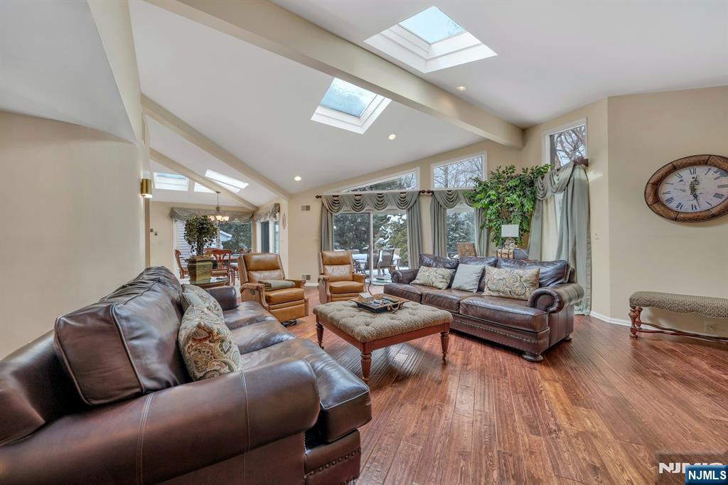 89 Barrett Lane Wyckoff, NJ 07481 - Photo 13 of 41 a living room with furniture and wooden floor