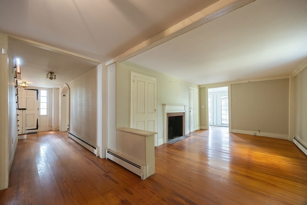 9 Abigail Drive Hudson, MA 01749 - Photo 17 of 36 a view of empty room with wooden floor