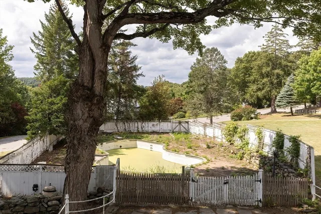 a view of swimming pool with a patio