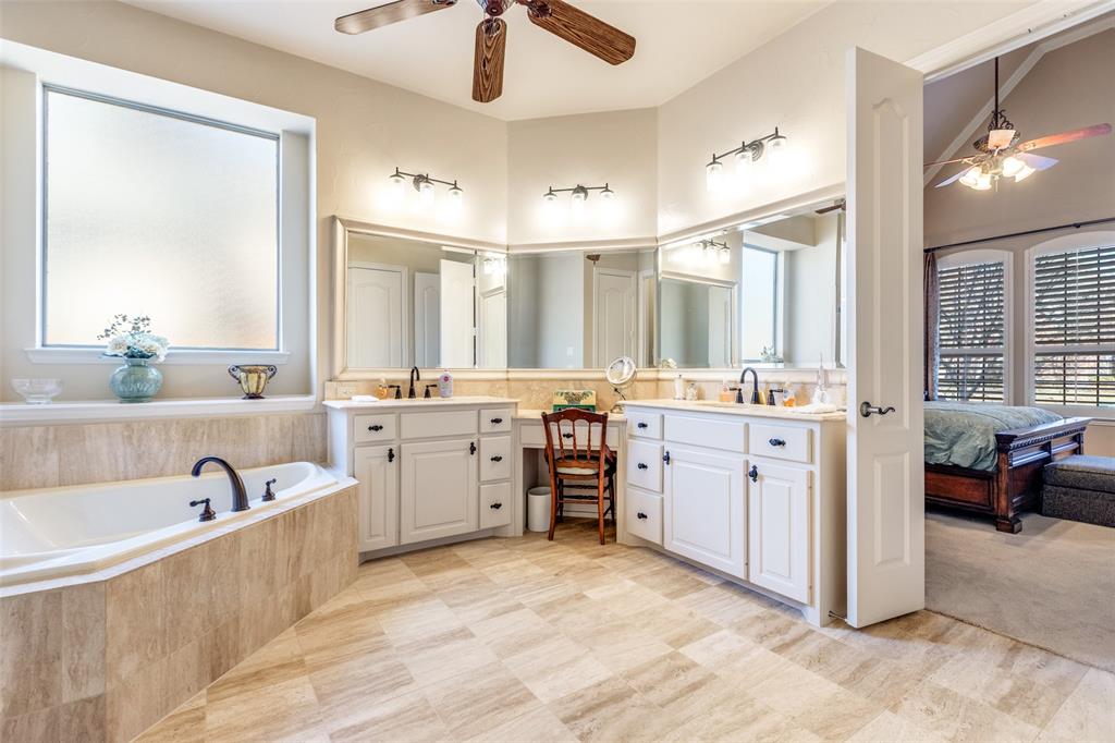 1109 Canton Court Allen, TX 75013 - Photo 23 of 40 a large spacious bathroom with a granite countertop tub sink and mirror