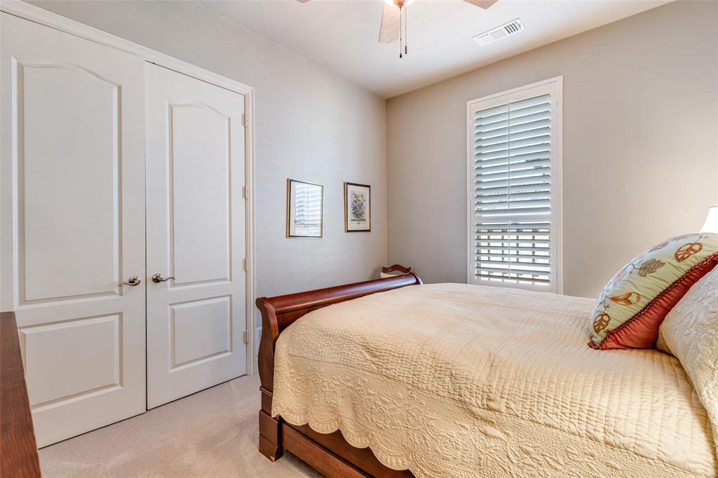 1109 Canton Court Allen, TX 75013 - Photo 25 of 40 a bedroom with a bed and a window