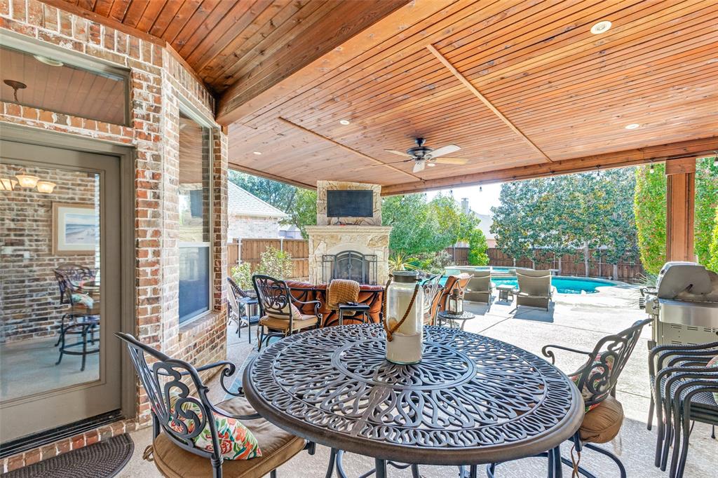 1109 Canton Court Allen, TX 75013 - Photo 32 of 40 a view of an outdoor dining space with a table and chairs