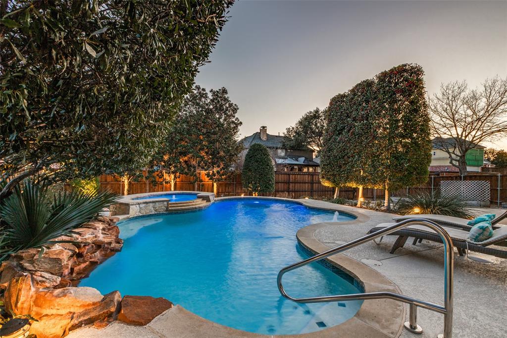 1109 Canton Court Allen, TX 75013 - Photo 35 of 40 a backyard of a house with table and chairs
