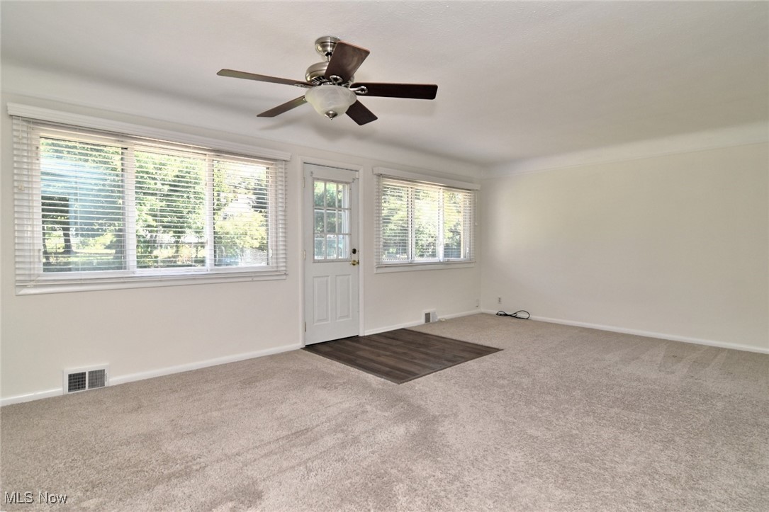 981 Hanley Road Cleveland, OH 44124 - Photo 9 of 42 Carpeted entrance foyer with baseboards and a ceiling fan