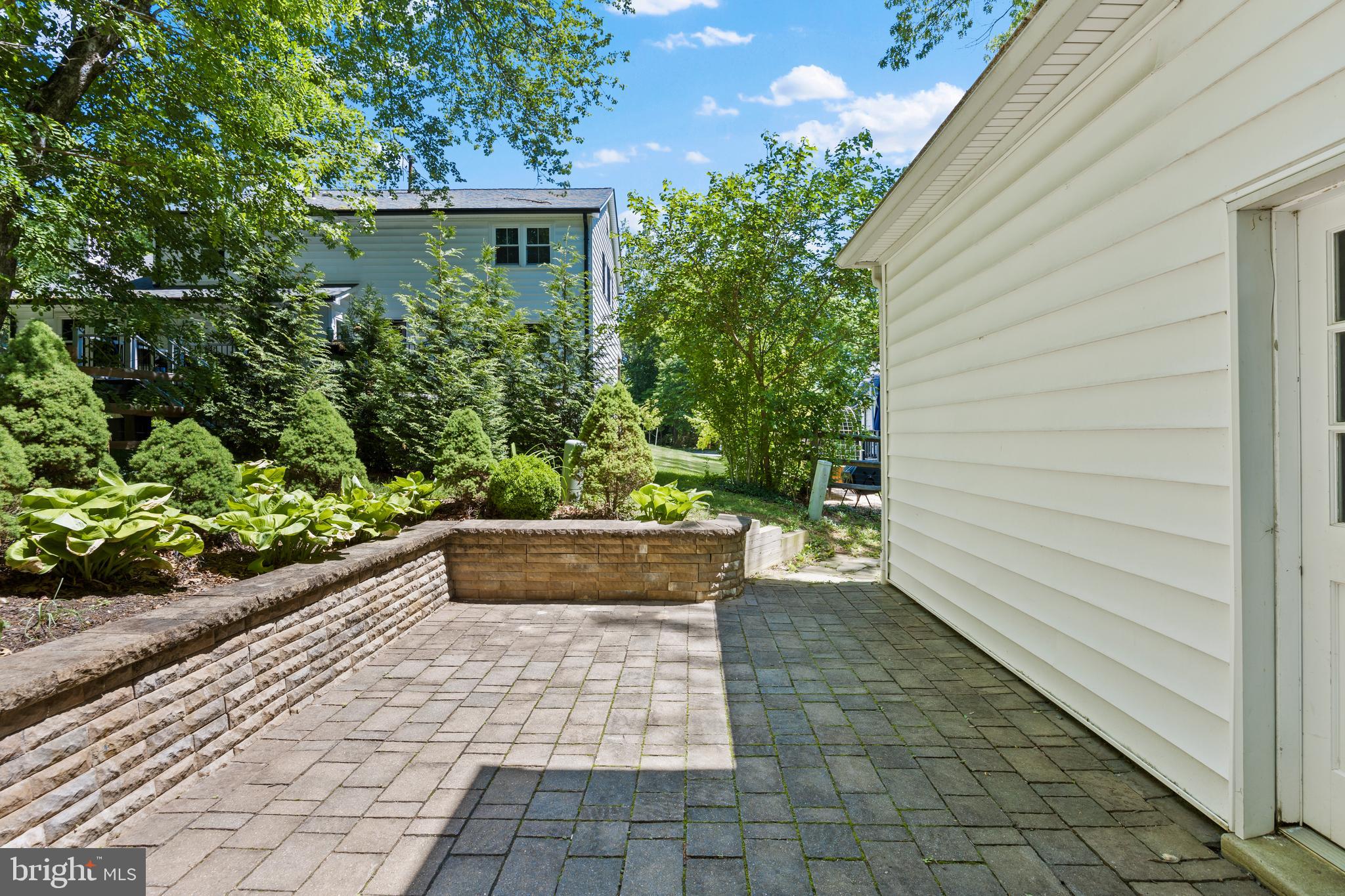 11019 Ring Road Reston, VA 20190 - Photo 70 of 78 a view of a back yard with potted plants