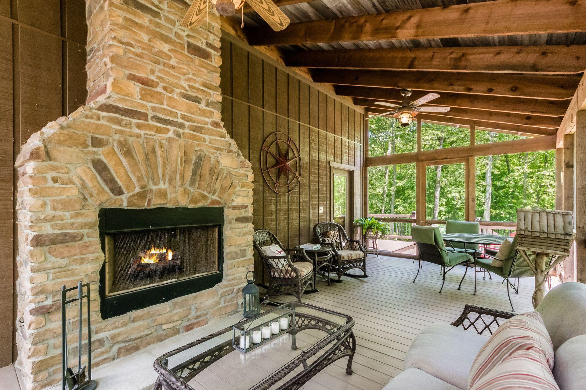 11444 Hazel Dell Road Howard, OH 43028 - Photo 24 of 41 Log fireplace perfect for chilly evenings.
