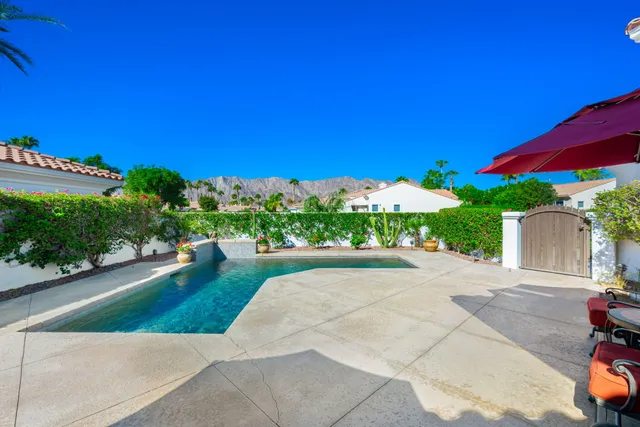a view of a street with a building in the background