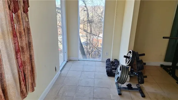 a view of a room with gym equipment