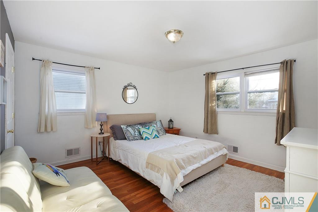 15 Ferris Road Edison, NJ 08817 - Photo 10 of 24 a bedroom with a bed and window