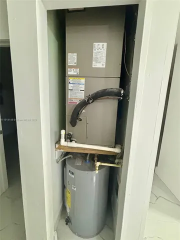 a view of an empty room with windows