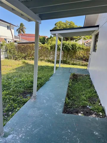 a view of a street with cars
