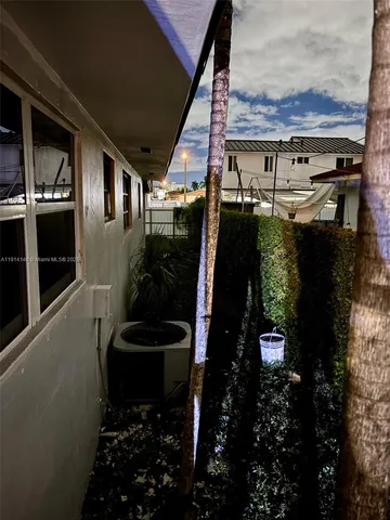 a view of a lake with a large trees