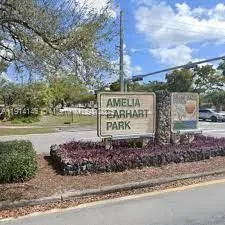 a view of a house with iron stairs
