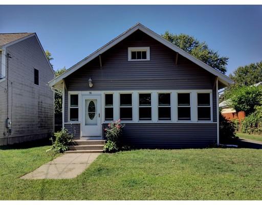 90 Lucerne Road Springfield, MA 01119 - Photo 1 of 24 a front view of a house with garden
