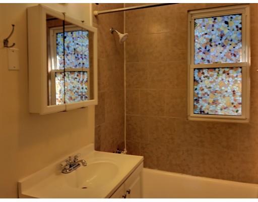 90 Lucerne Road Springfield, MA 01119 - Photo 12 of 24 a bathroom with a bathtub and shower