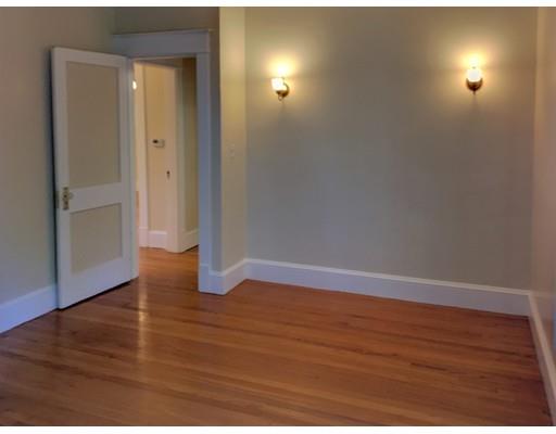 90 Lucerne Road Springfield, MA 01119 - Photo 15 of 24 a view of an empty room with wooden floor and closet