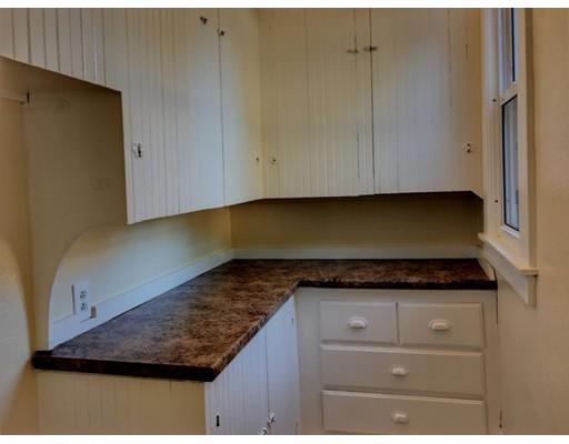 90 Lucerne Road Springfield, MA 01119 - Photo 7 of 24 a kitchen with granite countertop a sink and a stove